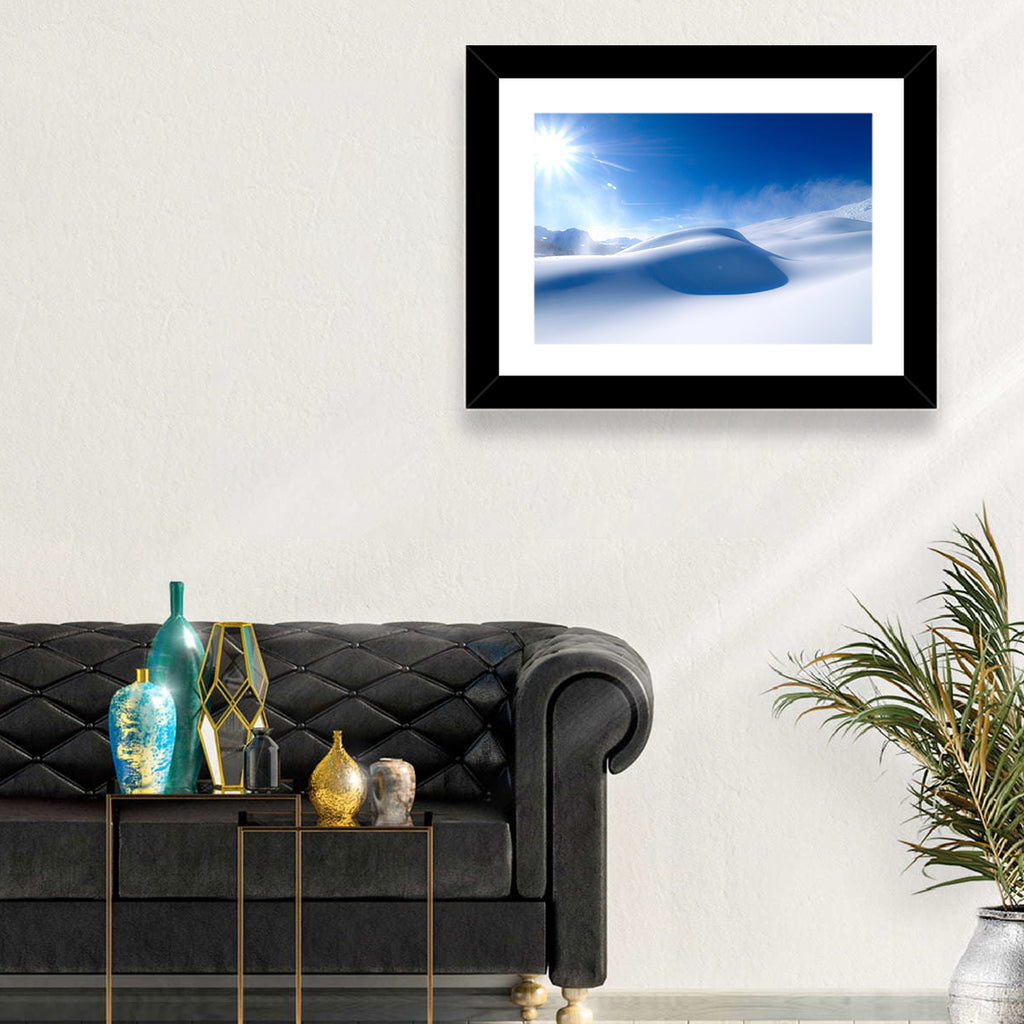 Sunlit Snow Dune Under Blue Sky Wall Art
