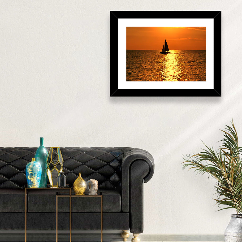 Sailboat Silhouette at Golden Sunset Wall Art