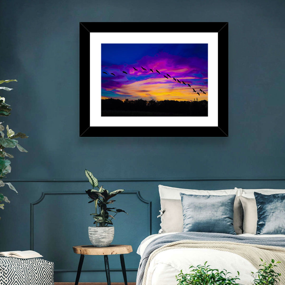 Silhouetted Cranes at Dusk Wall Art in a room, landscape