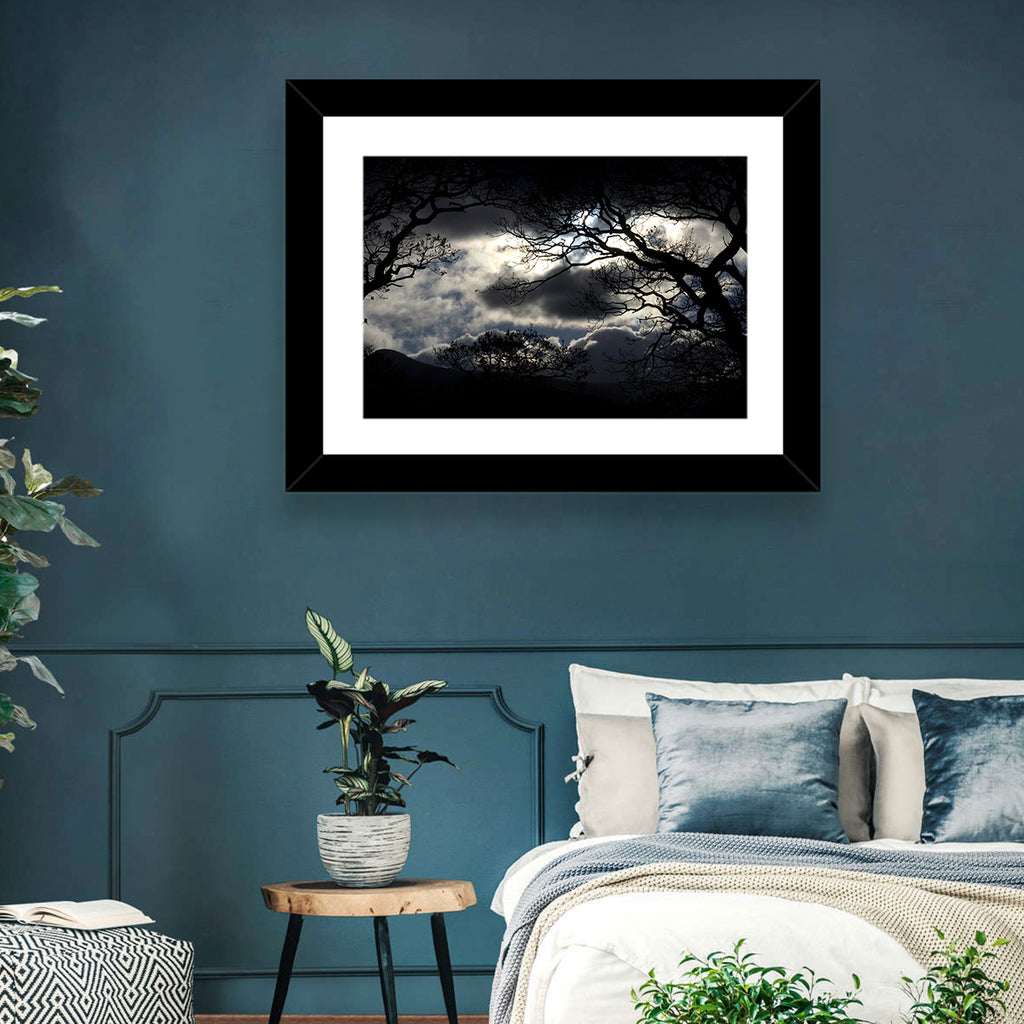 Storm Clouds Over Silhouetted Trees Wall Art