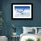 Commercial Jet Above Clouds Wall Art