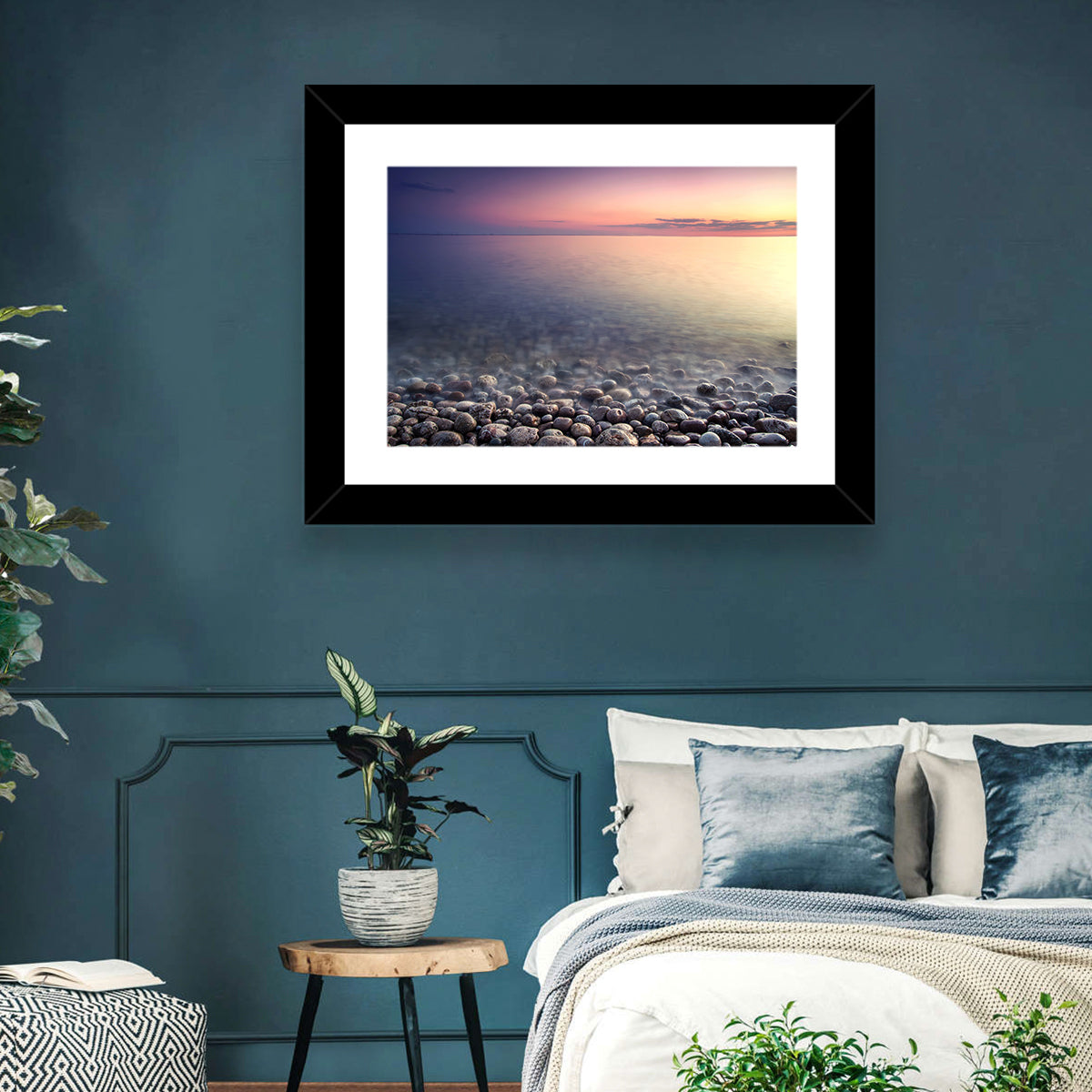 Pebbled Shore Sunset Wall Art in a room, landscape