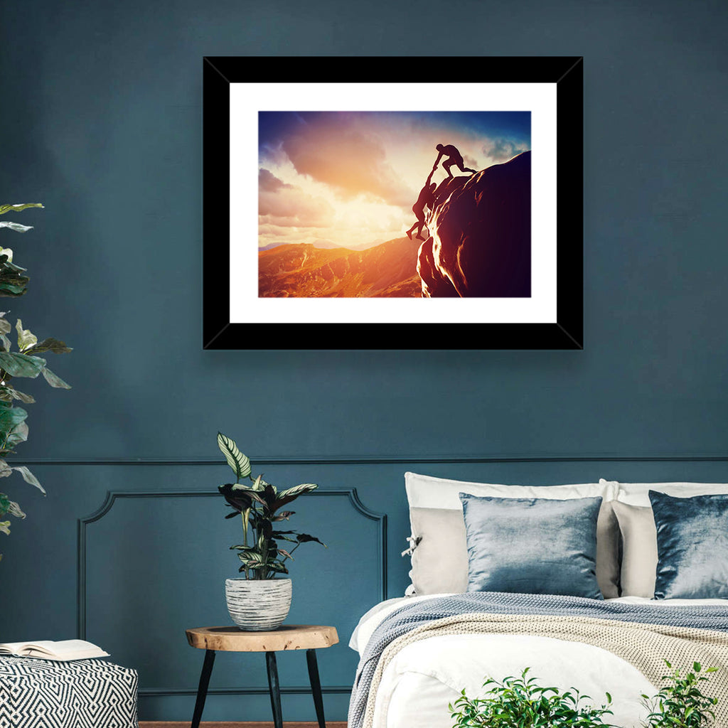 Two Hikers Summit Assist at Sunset Wall Art