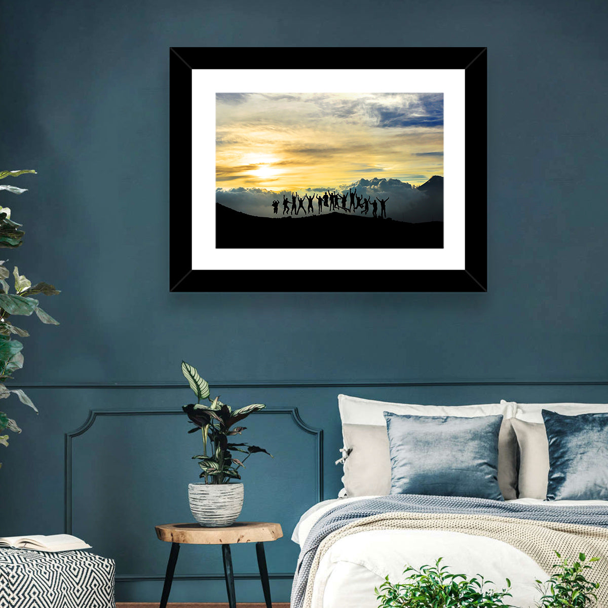 Golden Team Silhouettes at Sunset Wall Art in a room, landscape