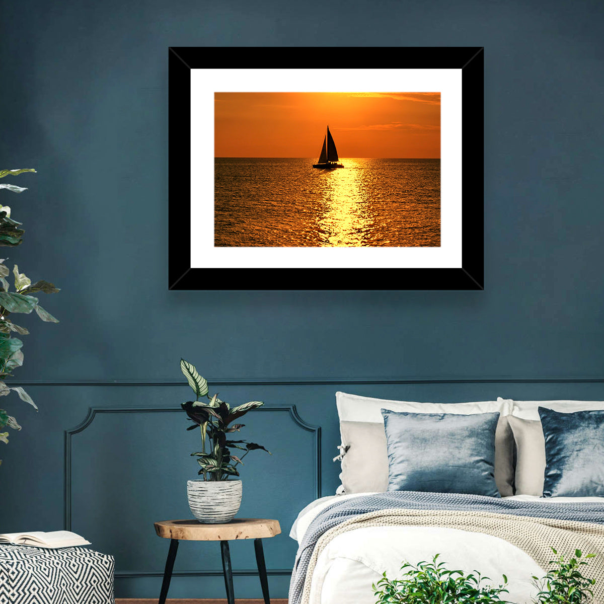 Sailboat Silhouette at Golden Sunset Wall Art in a room, landscape
