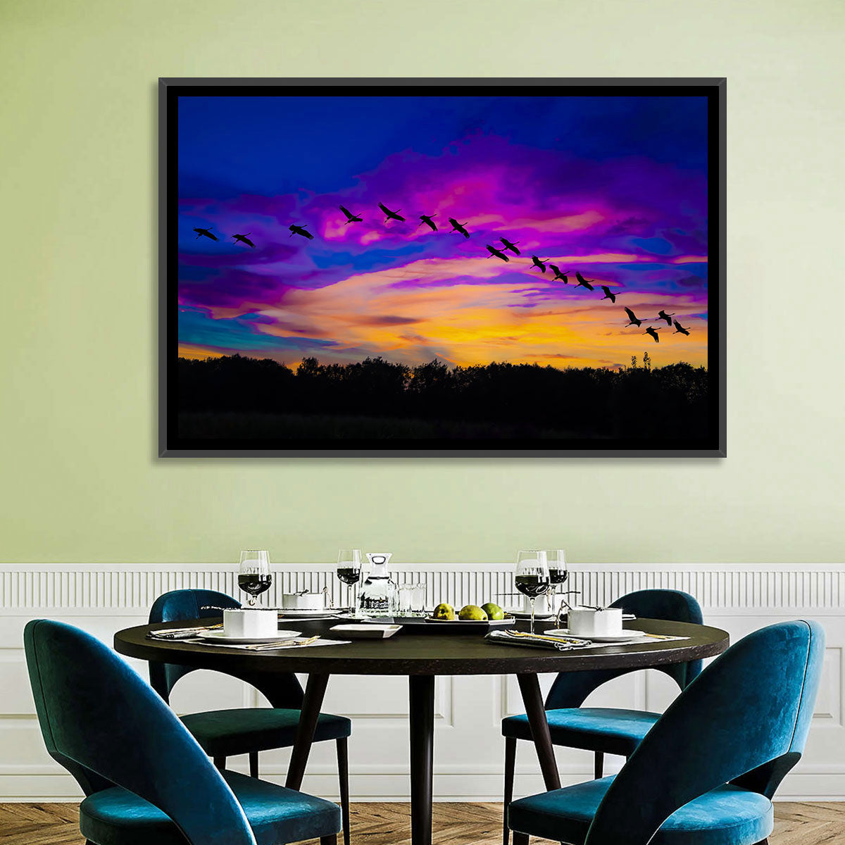 Silhouetted Cranes at Dusk Wall Art in a room, landscape