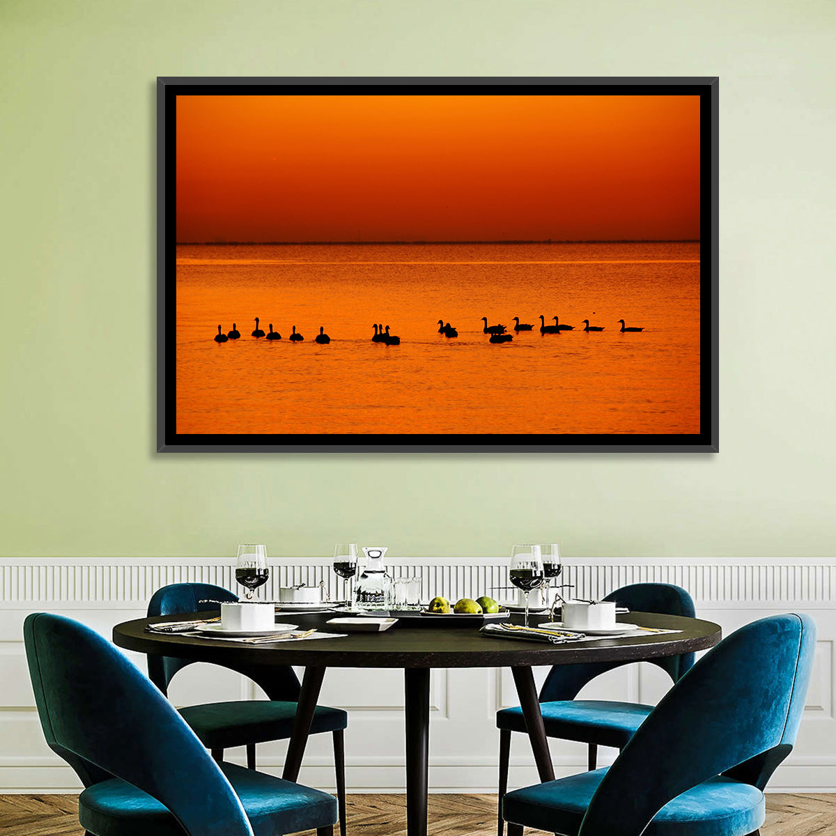 Geese Silhouettes at Orange Sunset Wall Art in a room, landscape
