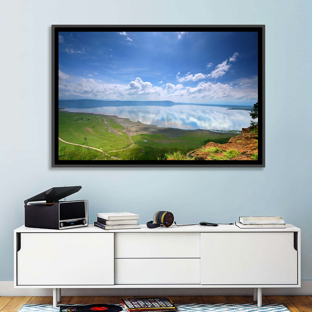 Lake Nakuru Cliffside Reflection Wall Art in a room, landscape