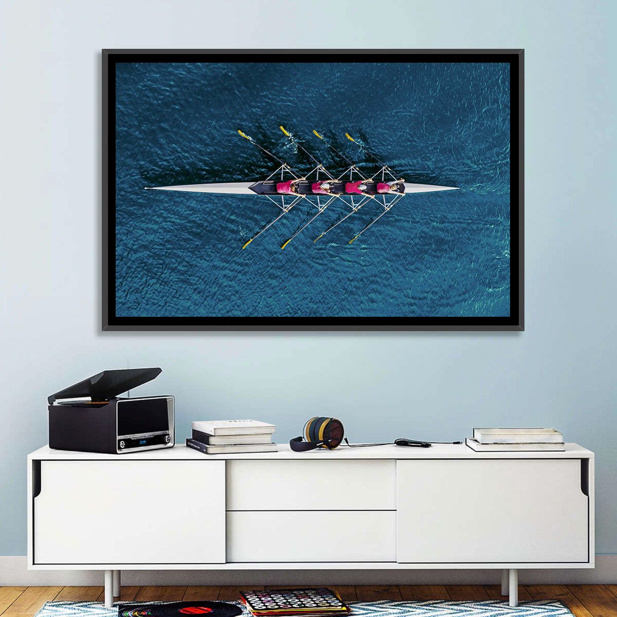 Four Rowers in Pink Shirts Wall Art in a room, landscape
