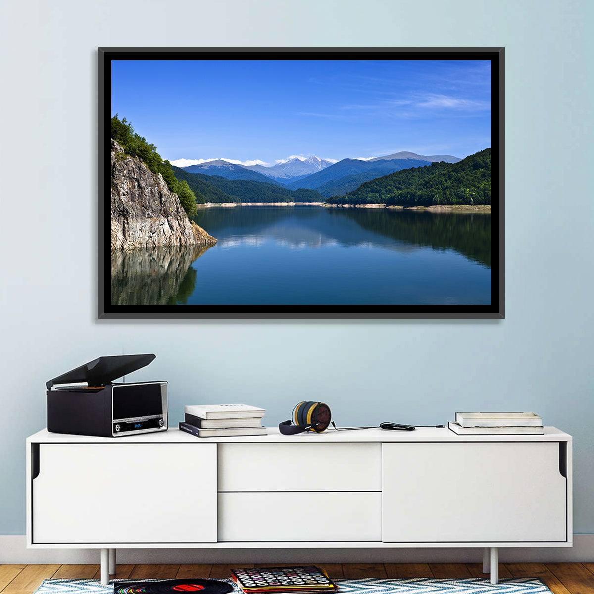 Cliffside Mountain Lake Reflection Wall Art in a room, landscape