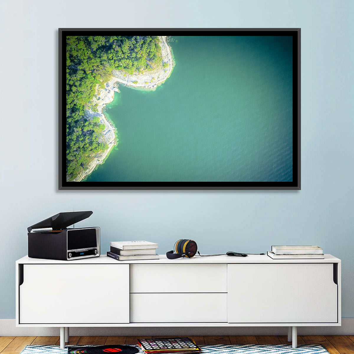 L-shaped Coastline Over Teal Lake Wall Art in a room, landscape