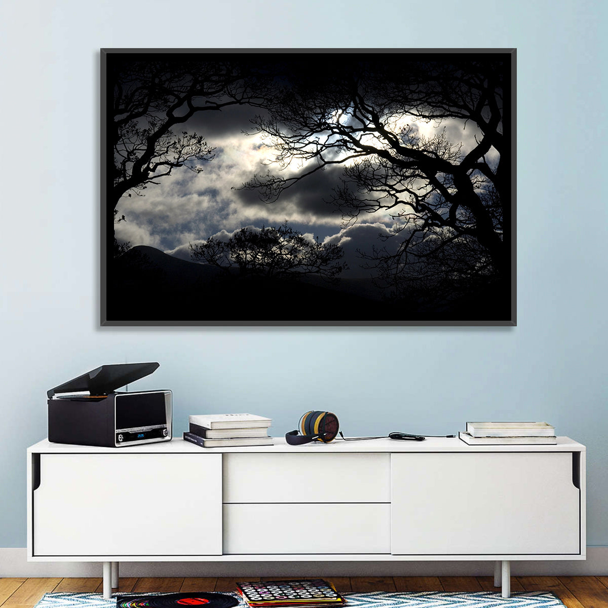 Storm Clouds Over Silhouetted Trees Wall Art in a room, landscape