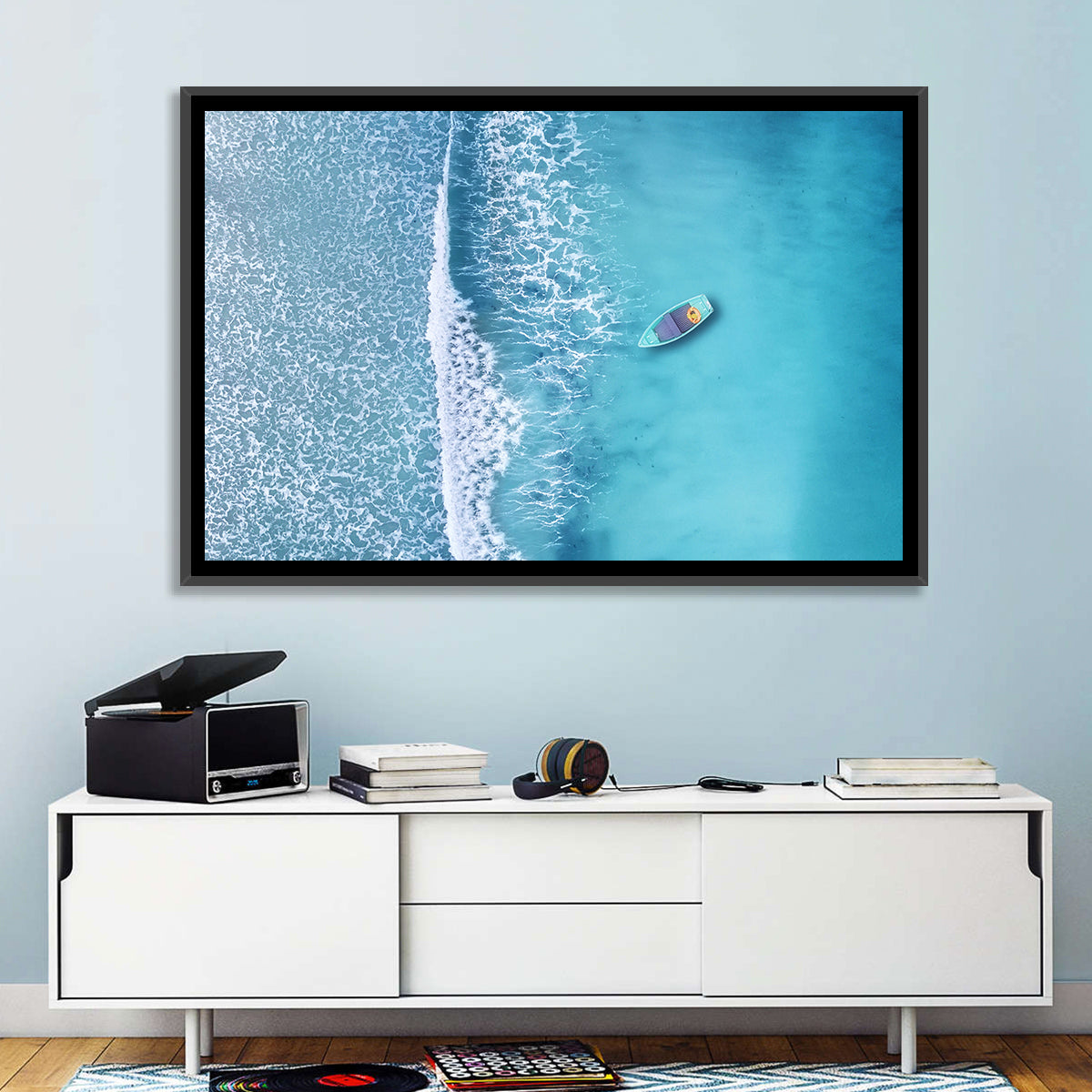 Lone Boat Over Turquoise Waves Wall Art in a room, landscape