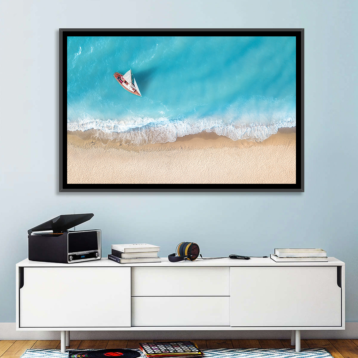 Centered Sailboat Over Turquoise Sea Wall Art in a room, landscape