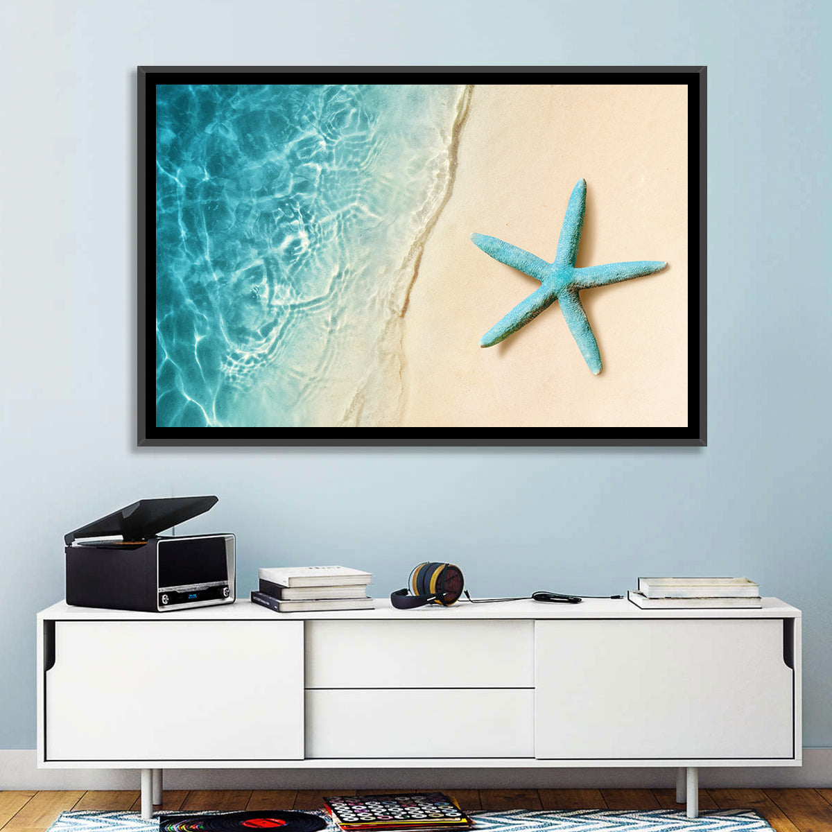 Blue Starfish on Sandy Beach Wall Art in a room, landscape