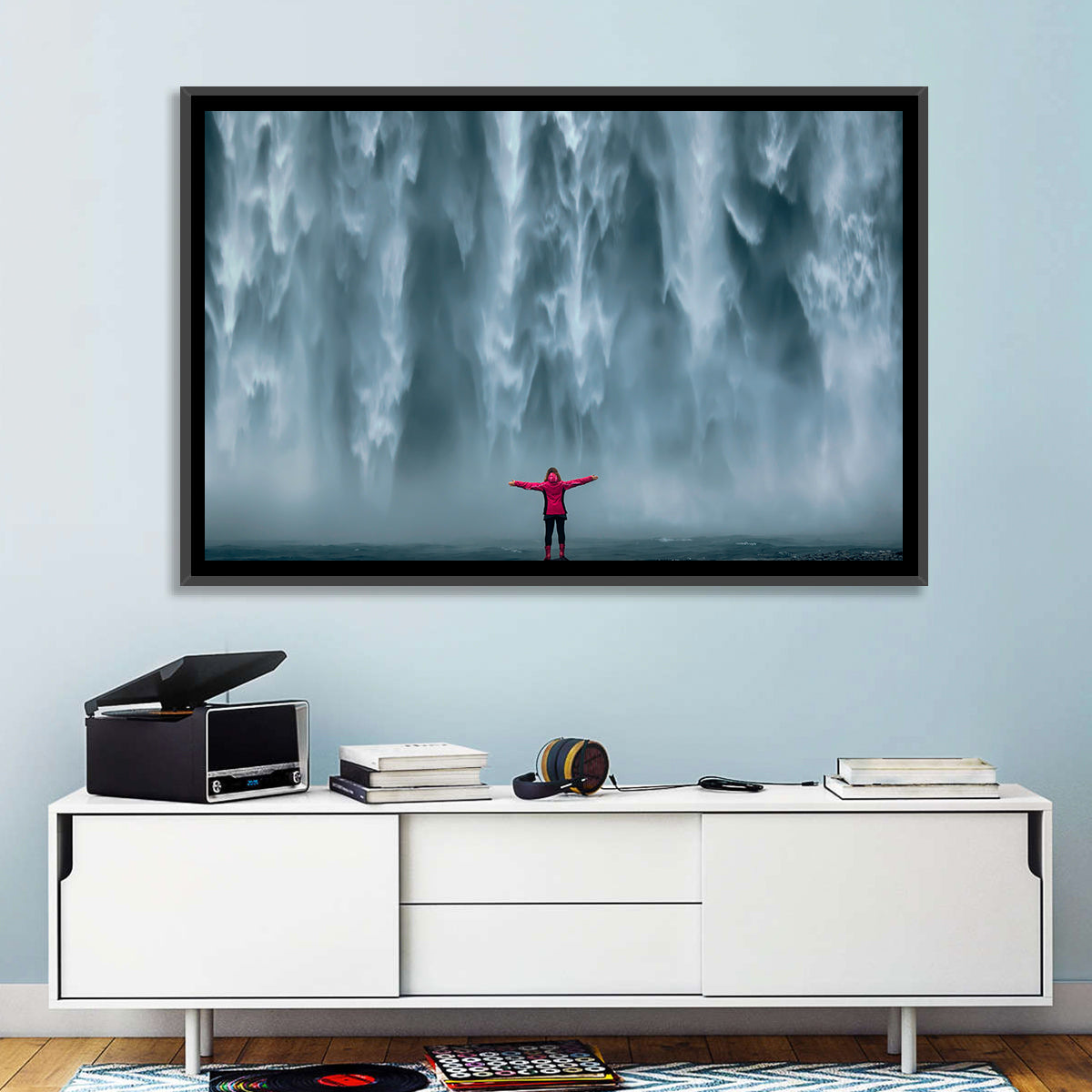 Skogafoss Waterfall with Figure in Pink Wall Art in a room, landscape