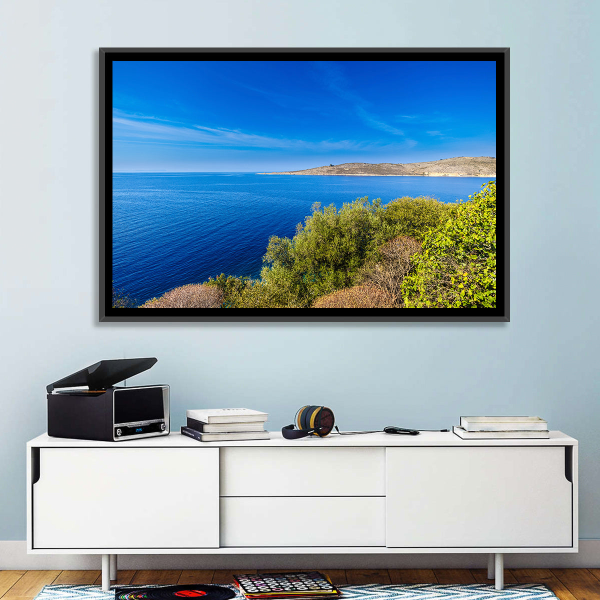 Sunlit Albanian Coastline Wall Art in a room, landscape