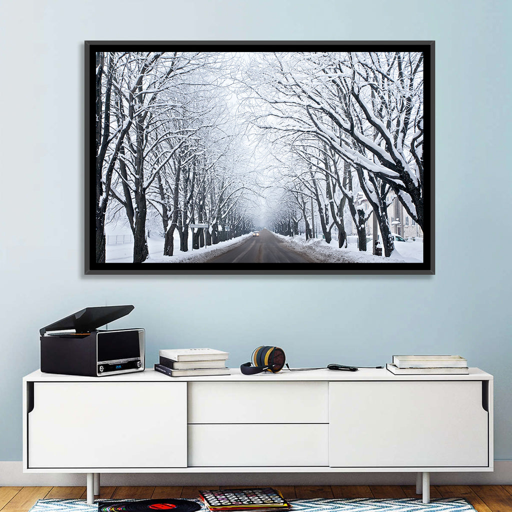 Snowy Road with Distant Headlights Wall Art