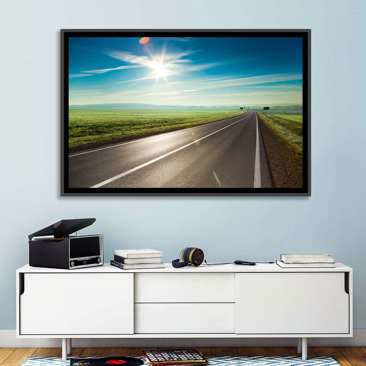 Sunlit Road Through Green Field Wall Art in a room, landscape