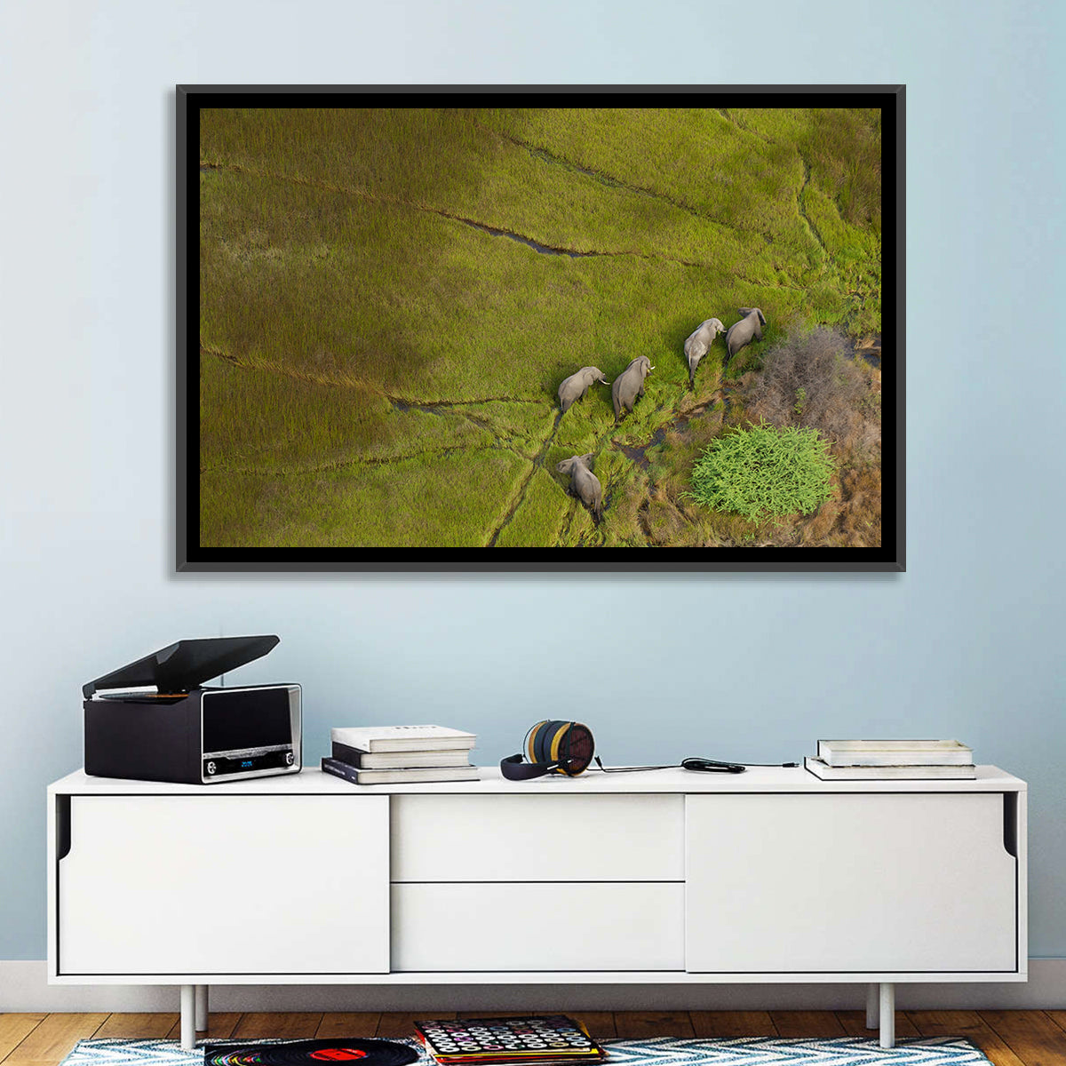 Aerial Herd of Elephants Wall Art in a room, landscape