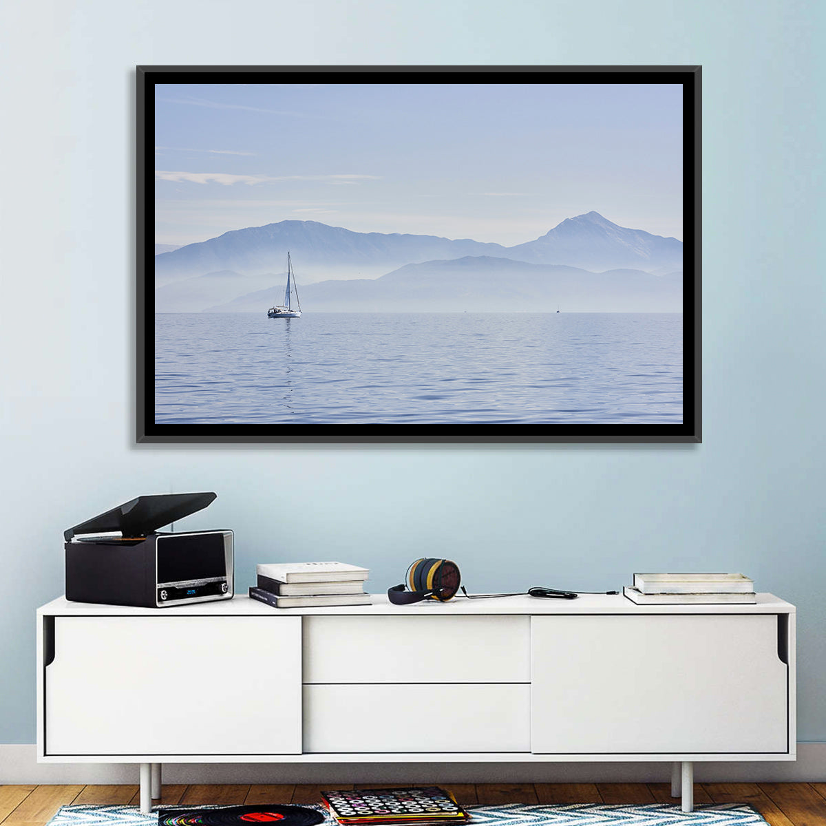 Sailboat and Misty Mountains Wall Art in a room, landscape