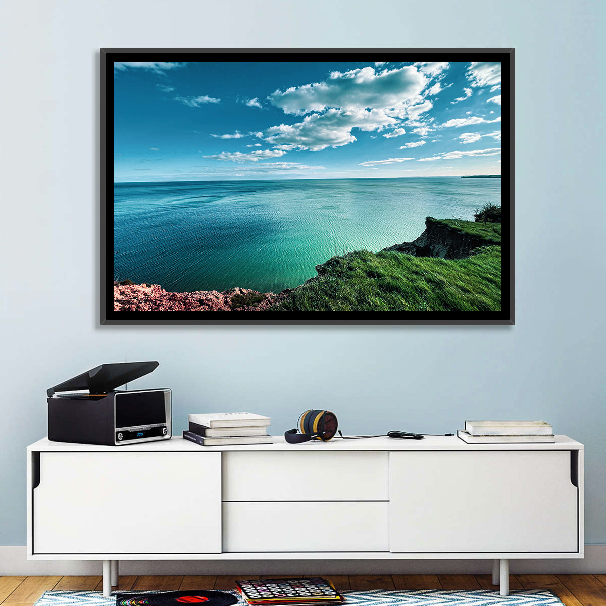 Coastal Cliffs Above a Turquoise Sea Wall Art in a room, landscape