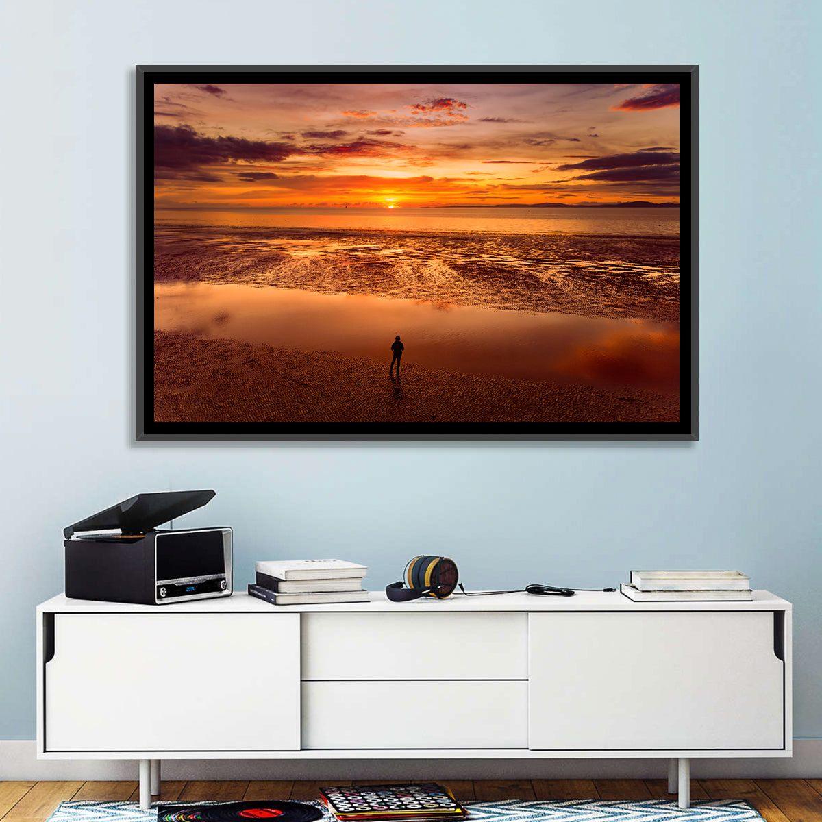 Solitary Figure on Sunset Shore Wall Art in a room, landscape