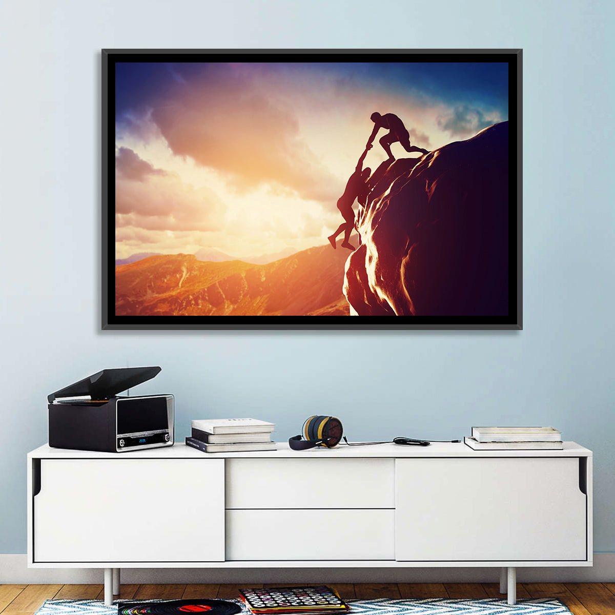 Two Hikers Summit Assist at Sunset Wall Art in a room, landscape