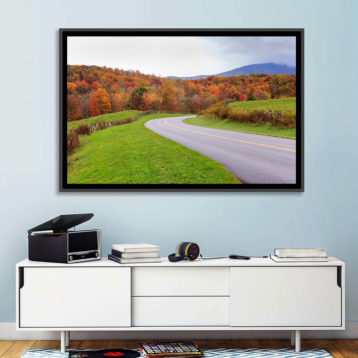 Curving Road Through Autumn Meadow Wall Art in a room, landscape