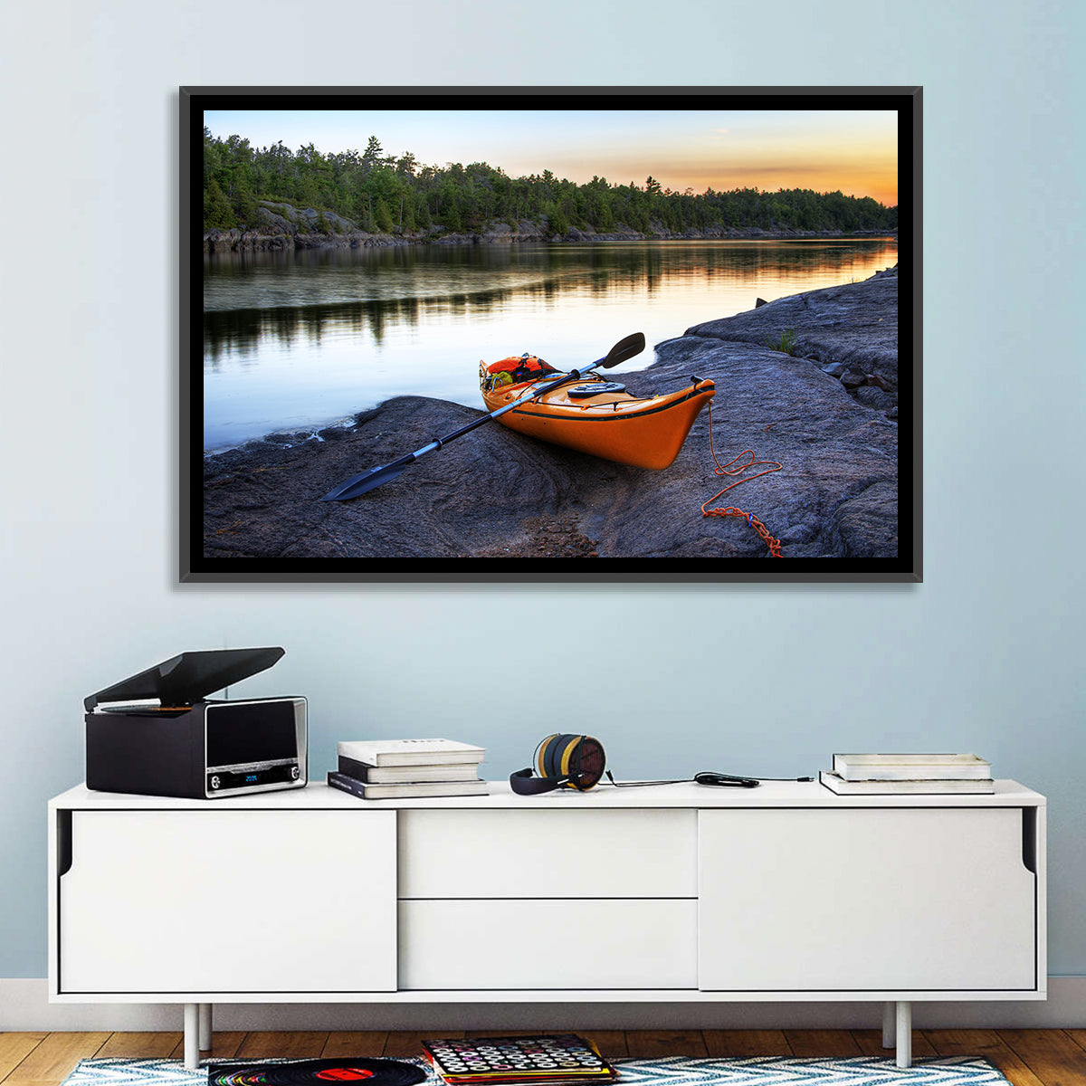 Orange Kayak on Rocky Shore Wall Art in a room, landscape