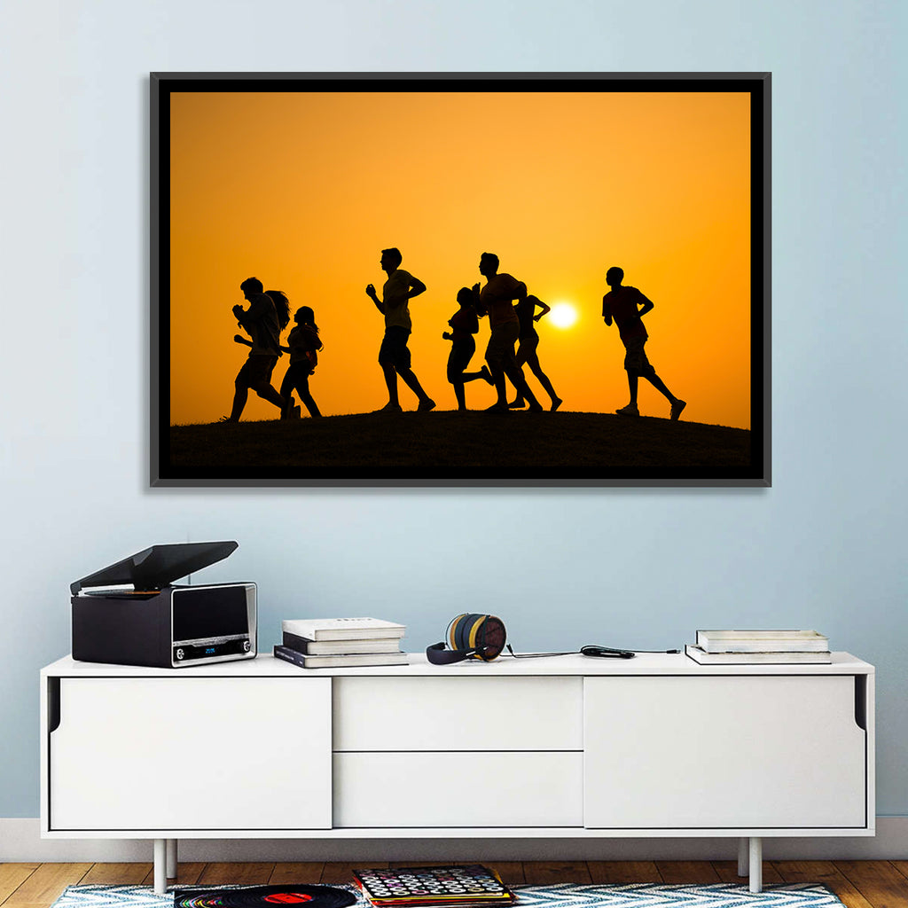 Six Runners Silhouette at Golden Sunset Wall Art