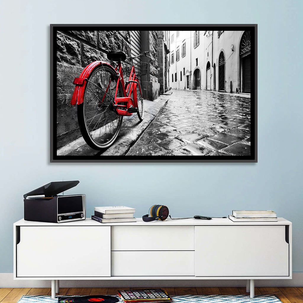 Red Bicycle on Rainy Cobblestone Street Wall Art