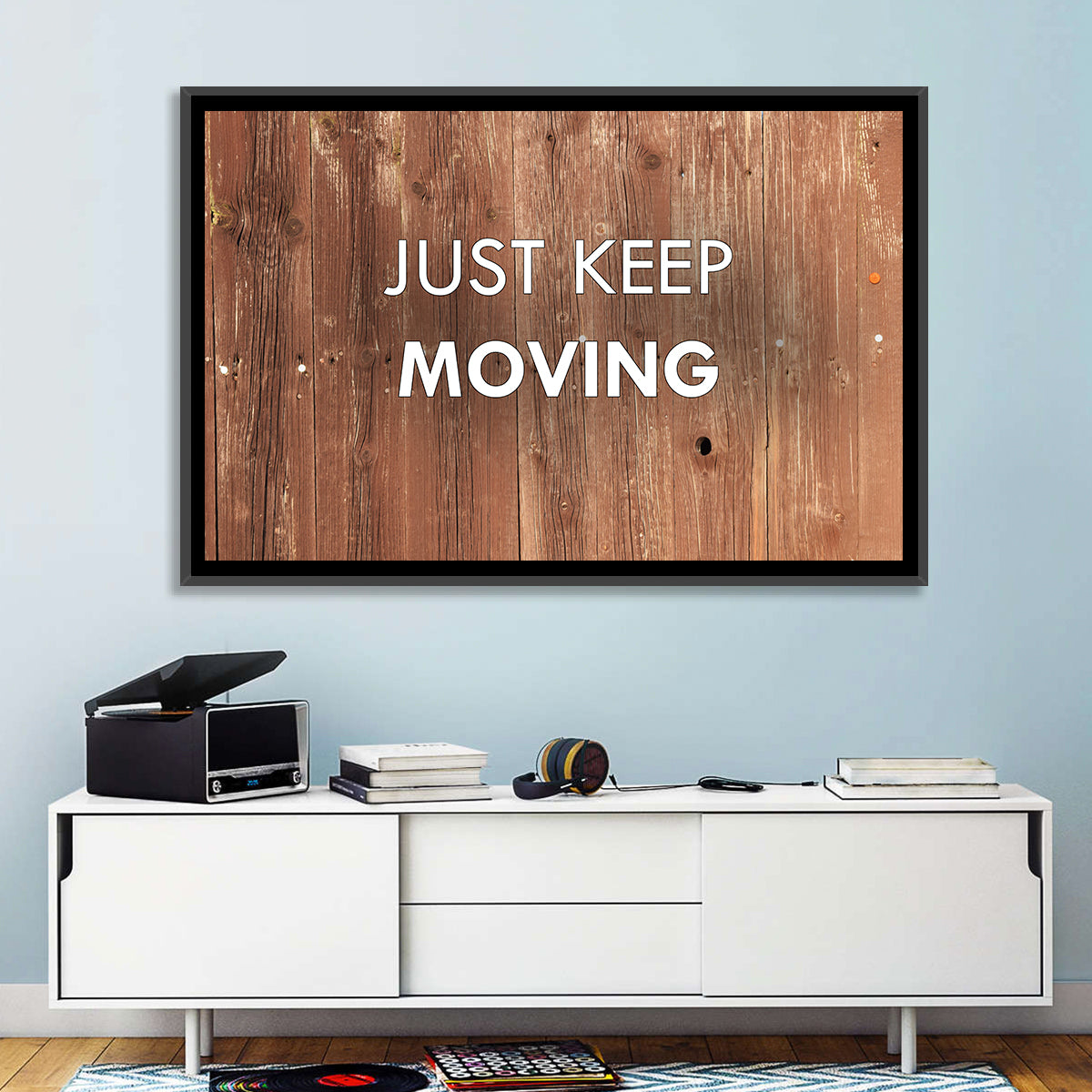 Just Keep Moving Rustic Quote Wall Art in a room, landscape