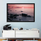 Pink Dusk Lakeshore with Silhouetted Rocks Wall Art