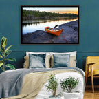 Orange Kayak on Rocky Shore Wall Art