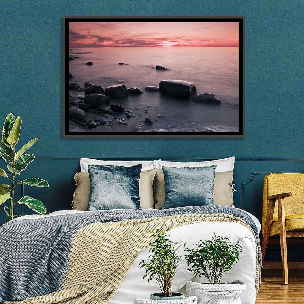 Pink Dusk Lakeshore with Silhouetted Rocks Wall Art