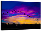 Silhouetted Cranes at Dusk Wall Art