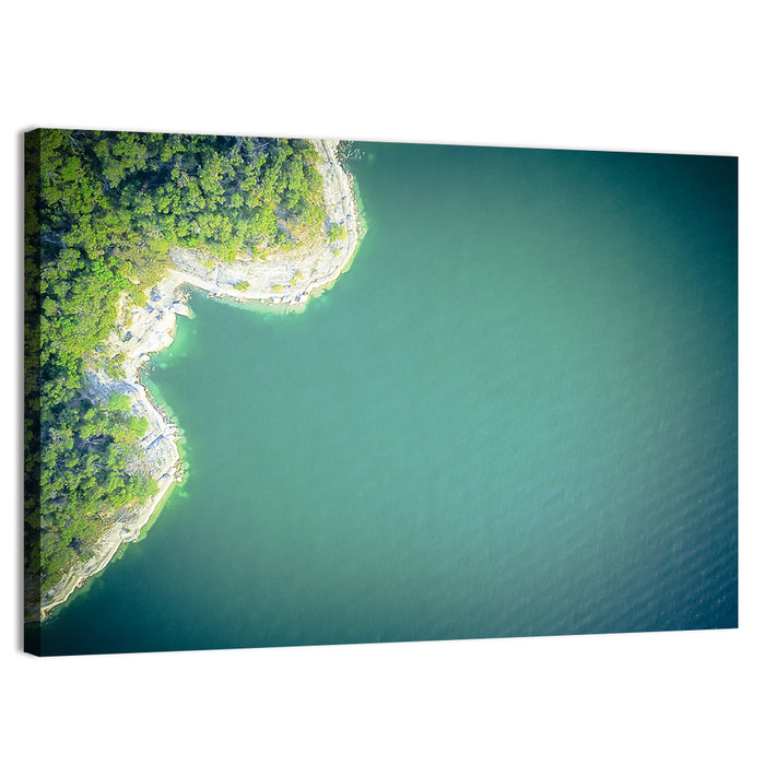 L-shaped Coastline Over Teal Lake Wall Art as a canvas print