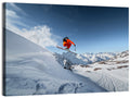 Airborne Skier Over Snowy Mountains Wall Art