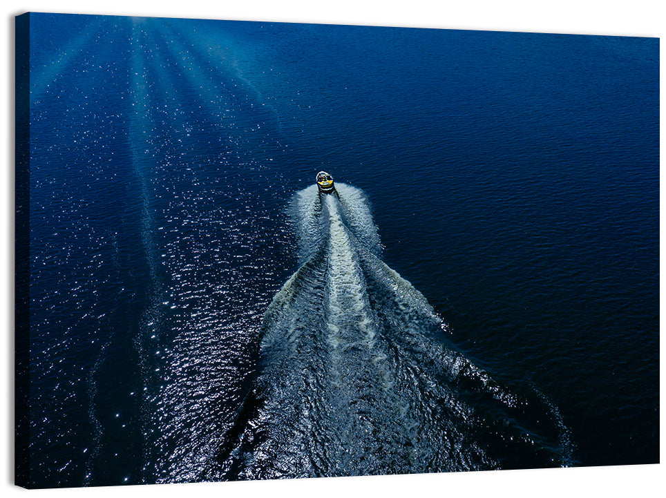 Aerial Boat Over Deep Blue Water Wall Art