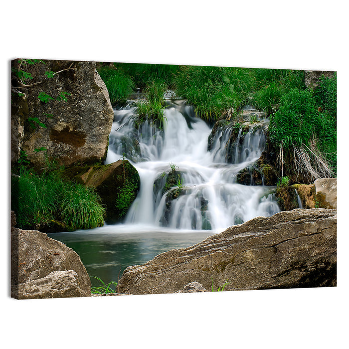 Moss Covered Rocky Waterfall Wall Art as a canvas print