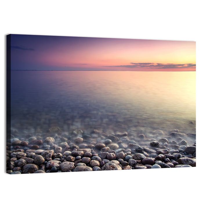 Pebbled Shore Sunset Wall Art as a canvas print