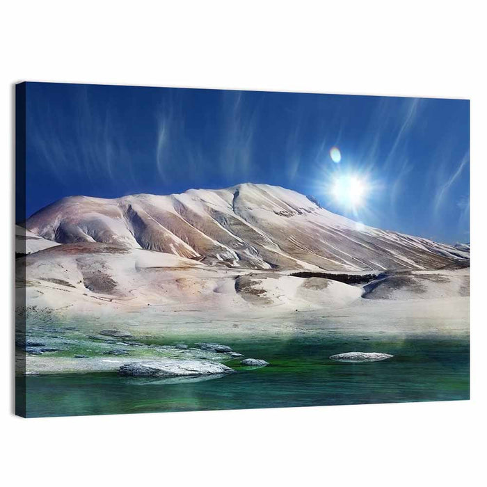 Sunburst Over Winter Mountain Wall Art as a canvas print