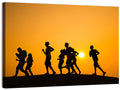 Six Runners Silhouette at Golden Sunset Wall Art