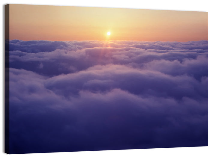 Sunset Over Endless Clouds Wall Art as a canvas print