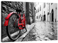 Red Bicycle on Rainy Cobblestone Street Wall Art