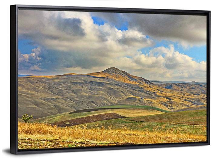 Shamakhi Valley Harvest Fields Wall Art as a framed canvas