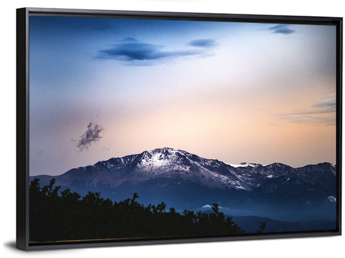 Snow-capped Pikes Peak at Dusk Wall Art as a framed canvas