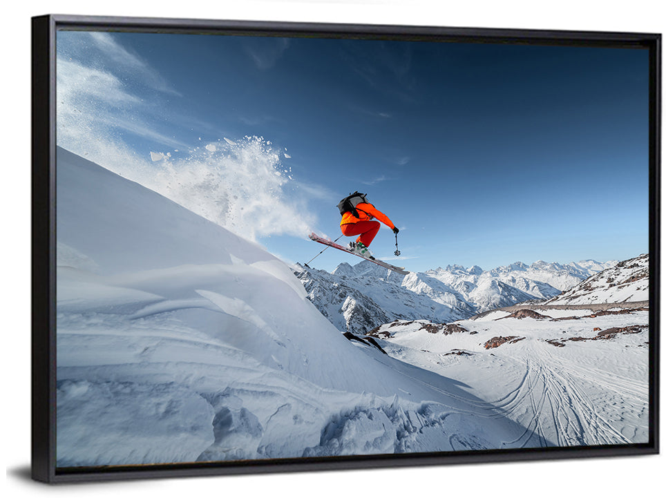 Airborne Skier Over Snowy Mountains Wall Art