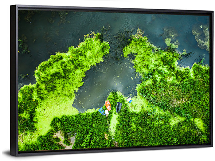 Green Algae Lake with Boats Wall Art as a framed canvas